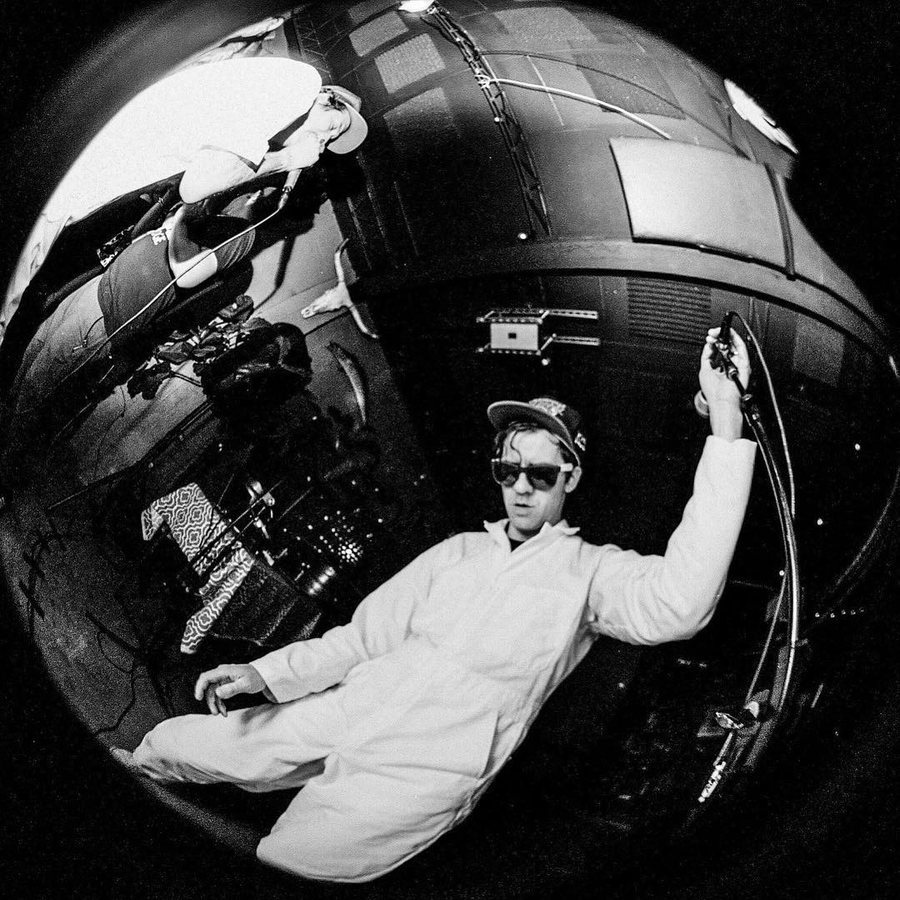 Hurricane Party through a fisheye lens on black and white film