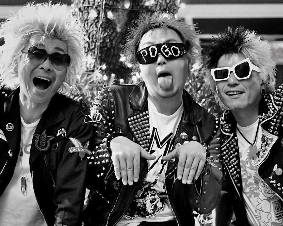 Shit-Faced, three spiked-hair punks mugging for the camera